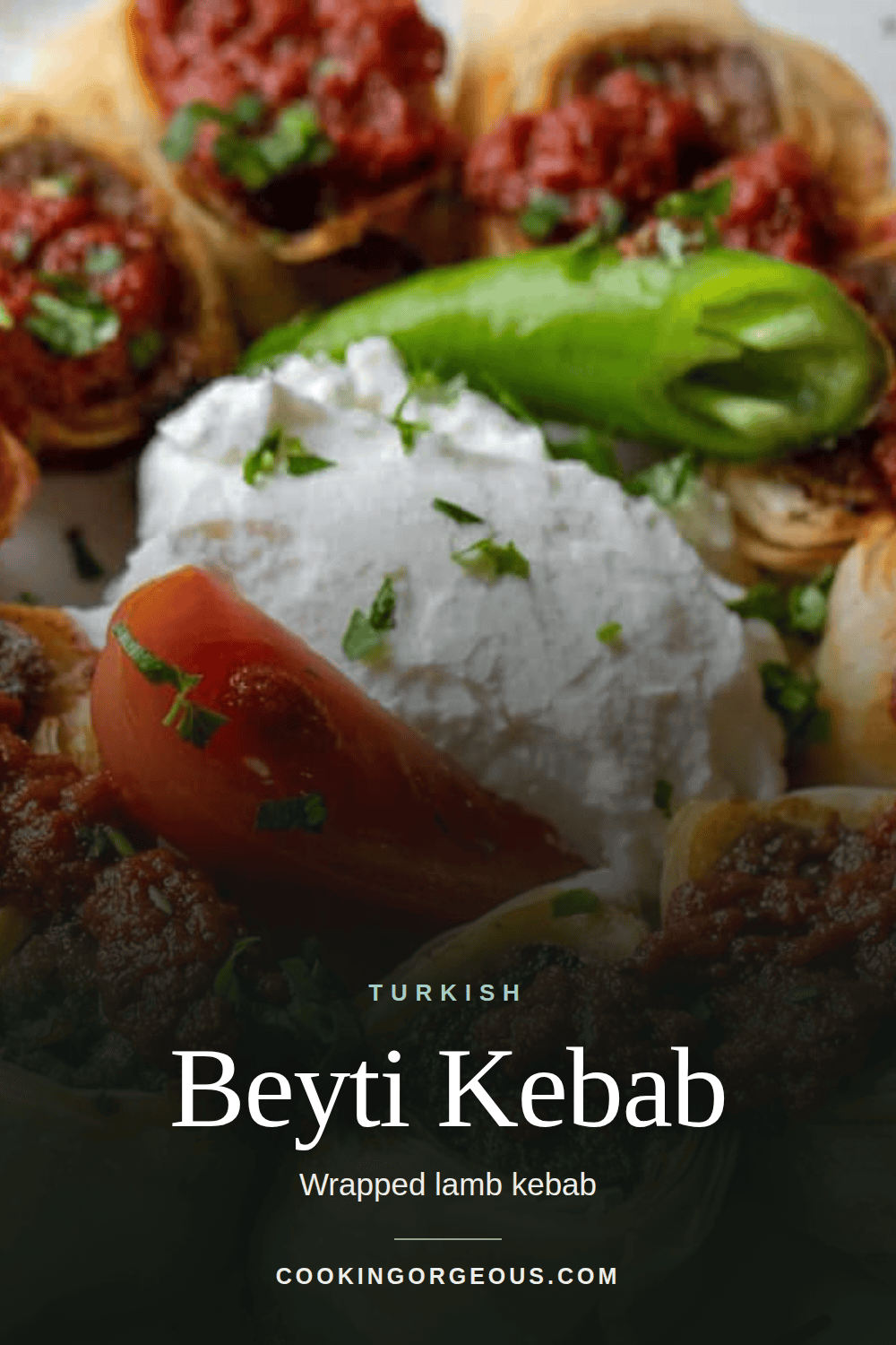 Beyti kebab wrapped in lavash with tomato sauce and yogurt.