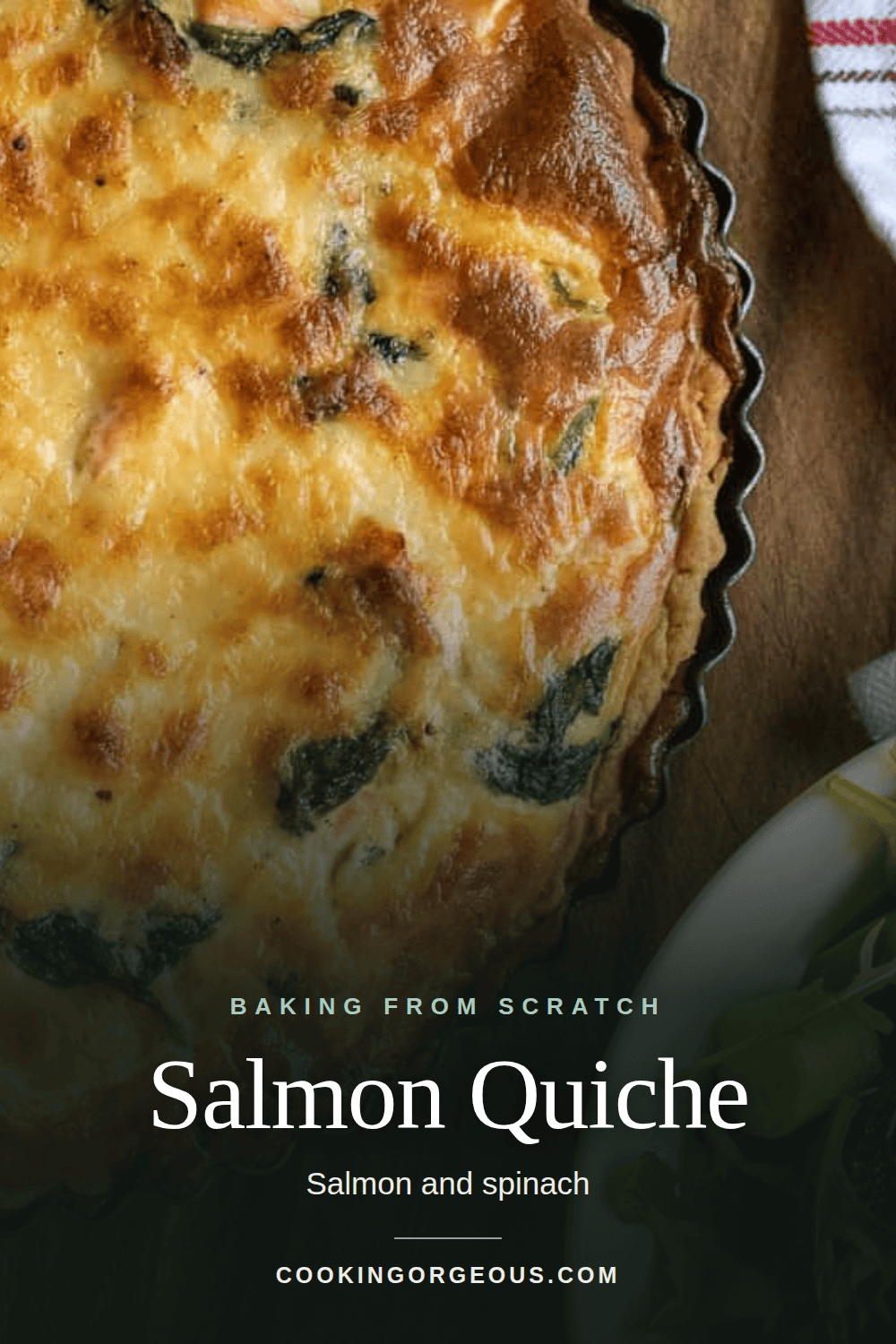 Salmon and spinach quiche with a slice cut out.