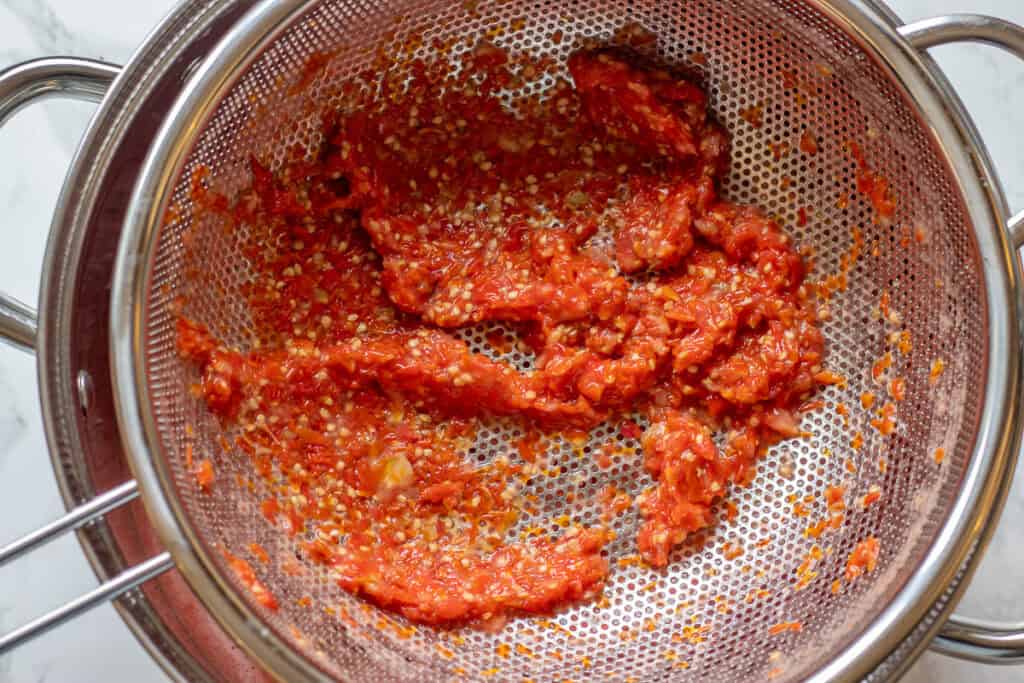 Seeds and skins left behind in the sieve after blending.