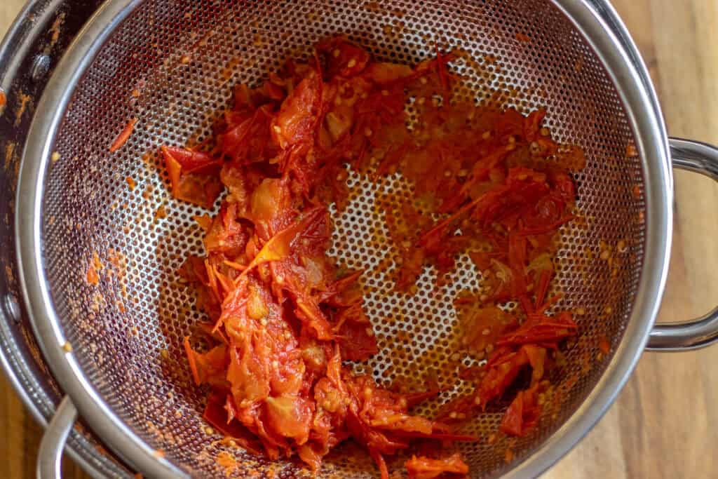 Skins and seeds left in the sieve after passing the tomatoes through.