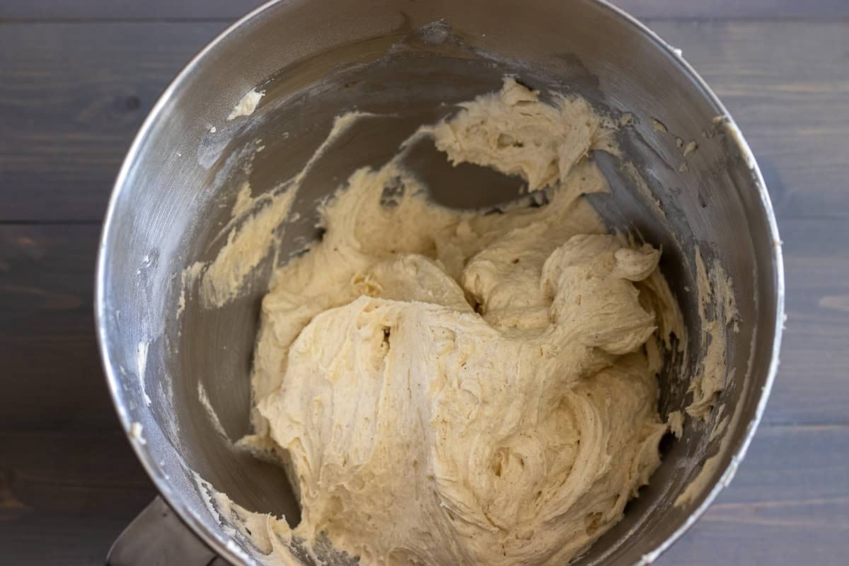 Thick batter in a mixing bowl after folding in the flour.