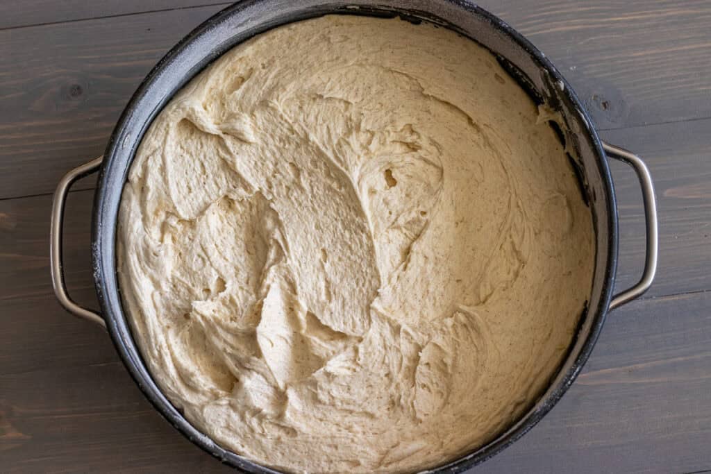 Batter spread evenly in a round cake pan.